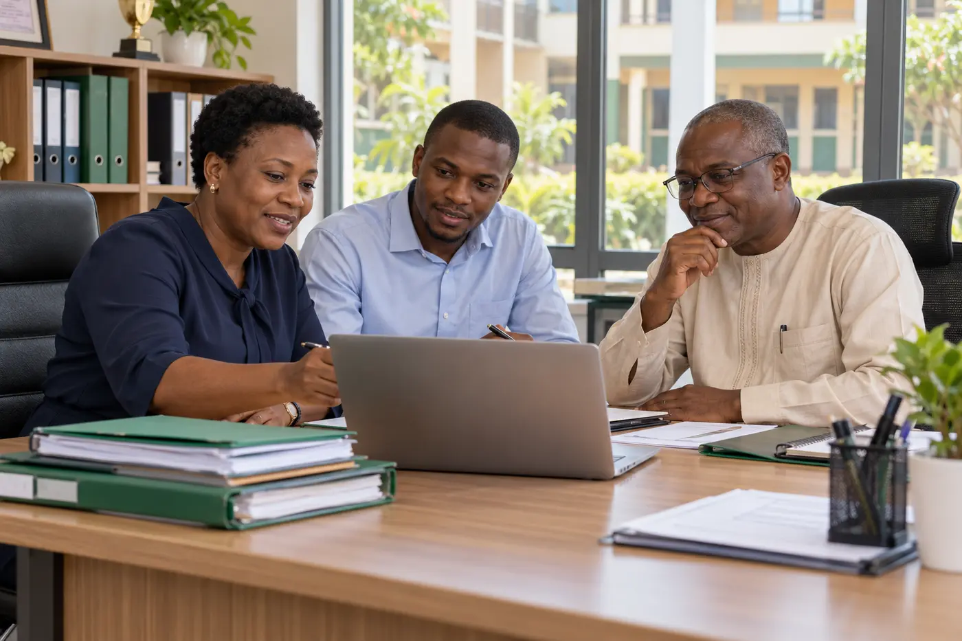 Illustrative school management team examining information and educational needs